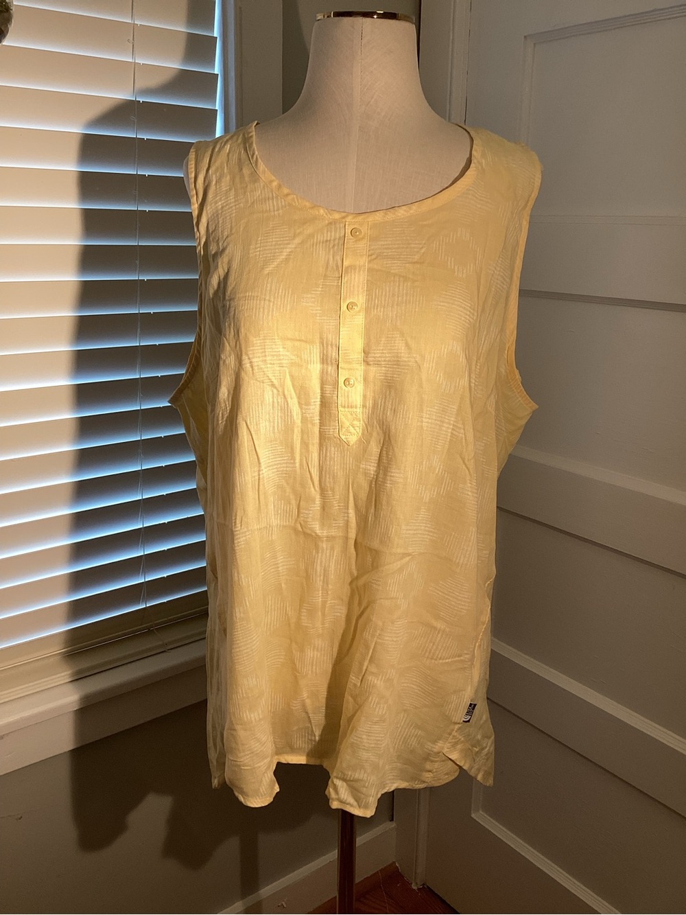 The North Face Women’s Pale Yellow Sleeveless Lightweight Henley Tank